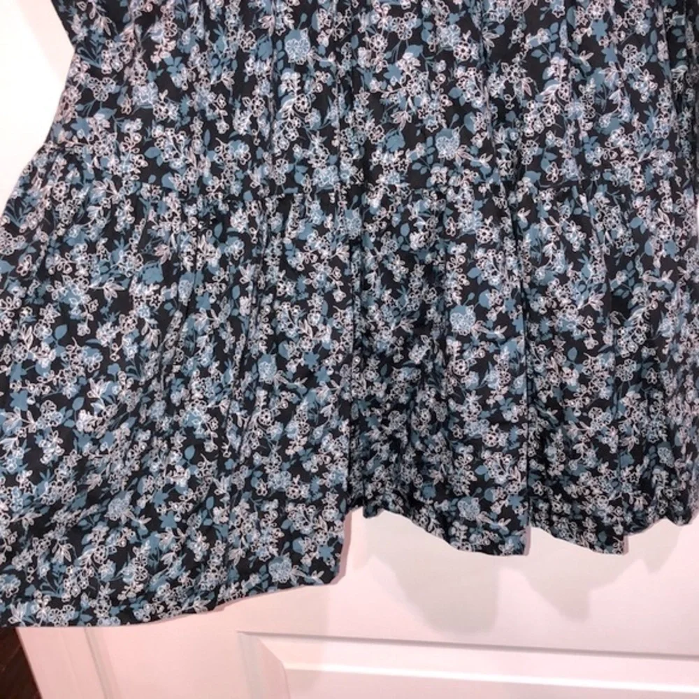 The Polly dress ditzy floral smocked boho dress size medium new with tags